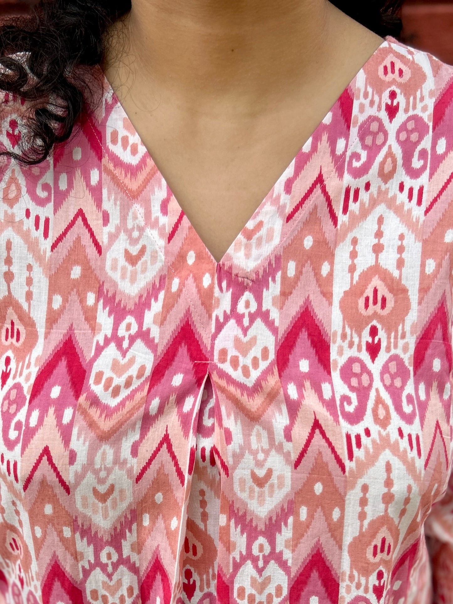 Gulabi Ikat A line kurta with two pockets